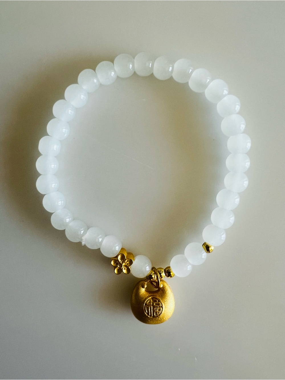 White Jade Bracelet with Gold Charm